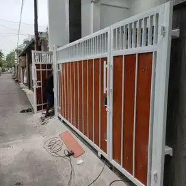 Pagar motif grc serat kayu minimalis