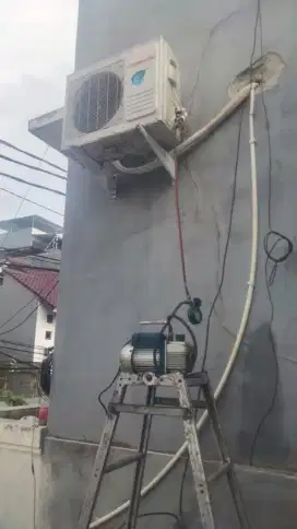Jasa servis AC kulkas frezer showcase mesin cuci dan bongkar pasang AC