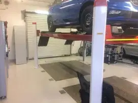 Four post lift kendaraan second