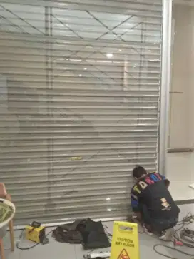 spesialis reparasi service rolling door murah