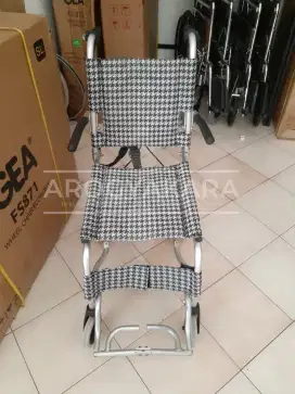 Kursi roda travelling bekas