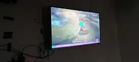 TV android merk coocaa 32 inc