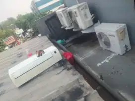 Jasa servis AC kulkas frezer showcase mesin cuci dan bongkar pasang AC