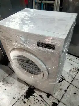 Sharp mesin cuci front loading normal garansi