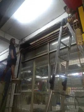 Tukang perbaikan pintu rolling door dan folding gate murah