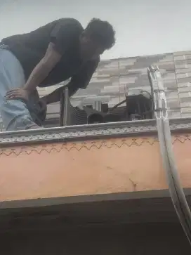 Jasa servis AC kulkas frezer showcase mesin cuci dan bongkar pasang AC