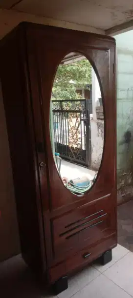 lemari jati pintu kaca oval