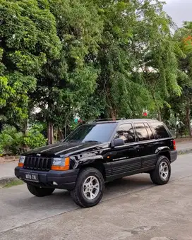 Jeep Grand Cherokee 4X4 Limited Hitam 1999 Antik Murmer Orisinilan
