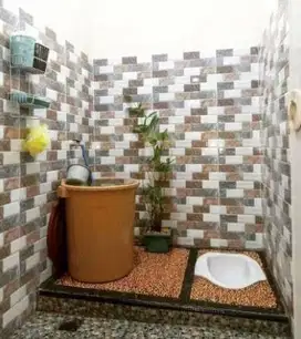 Tukang pasang keramik dan batu alam