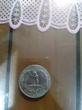 Uang quarter dollar Amerika