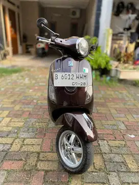 Piagio LX-150ie coklat vespa