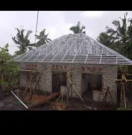 Atap rumah baja ringan Terpasng kulitas bagus bergarasi 15 tahun