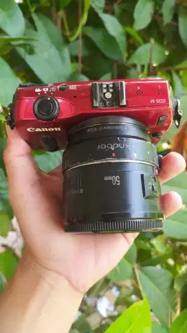 Kamera Canon Eos M lensa fix layar sentuh