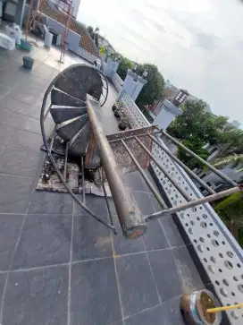 TANGGA PUTAR BESI BEKAS