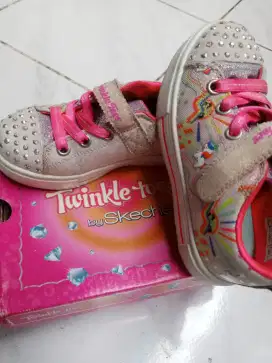 Skechers kids pink and white