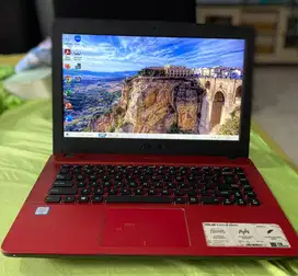 Laptop asus merah mempesona