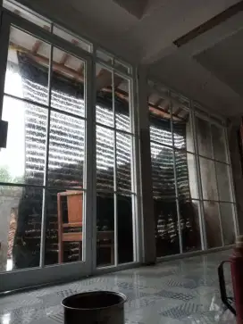 Kusen alumunium dan kaca
