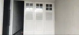 Pintu Garasi Sliding Tikung