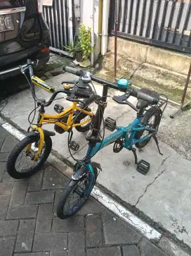 Sepeda anak bekas Polygon(kuning) dan Exotic (biru)