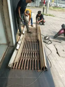 tukang perbaikan rolling door folding gate murah