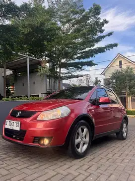 SX4 X over 2007 Orange Stylis dan Tangguh