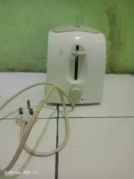 Alat pemangangg roti