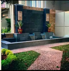 Kolam hias kombinasi kaca dan taman