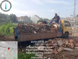 Jasa pengurugan puing dan buang sampah