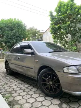 Mobil Mazda familia 1997 manual