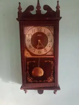 Jam dinding RHYLHM lubang 2