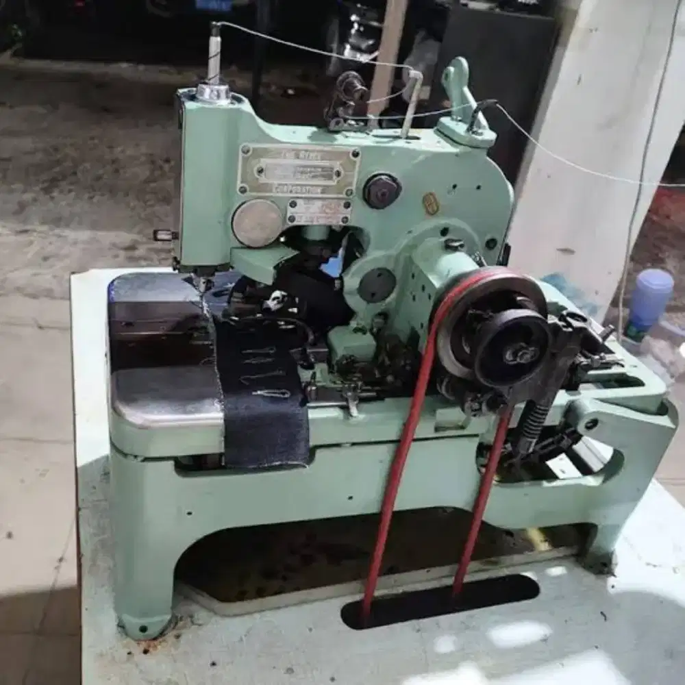 Mesin lobang kancing jeans jas