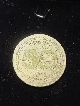 Koin commemorative Mc-D