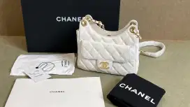 Preloved - Chanel Hobo White Quilted Caviar Small