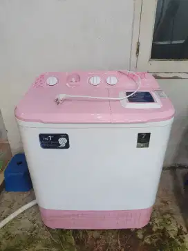 Mesin cuci merek Aqua hijab pink