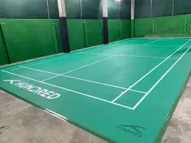 Penjaga GOR badminton