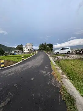 Tanah metro batu nol jalan aspal
