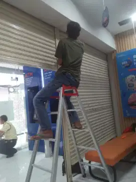 reparasi perbaikan rolling door folding gate murah