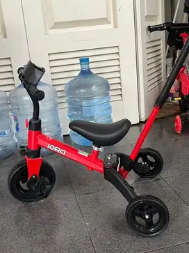 Sepeda dorong anak roda tiga