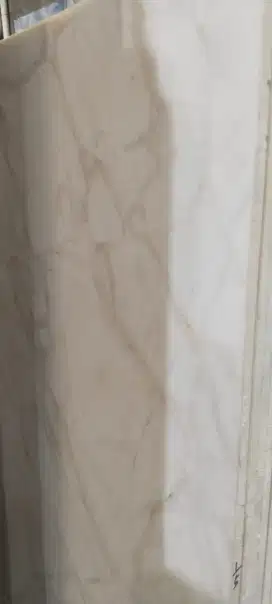 Proses pemasangan granit Quadra