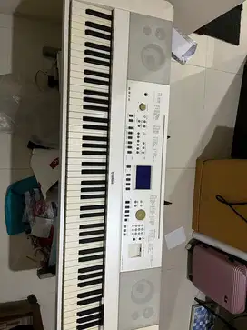 Piano merk Yamaha DGX - 650