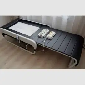 Tempat tidur terapi pijat