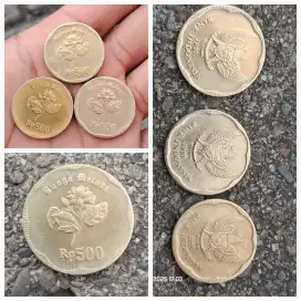 Uang koin kuno gambar burung garuda
