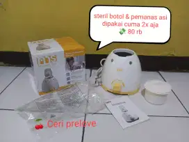 Steril botol penghangat asi MPASI