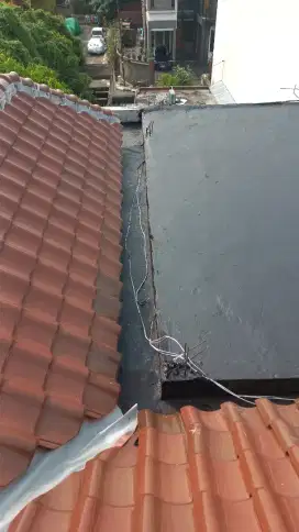 Tukang bangunan,perbaikan atap bocor,dag,talang,kanopi,renopasi dll