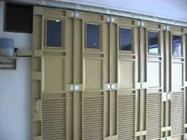 Pembuatan dan service pintu garasi terbaik termurah di bandung