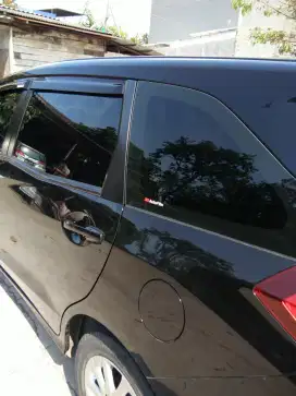 Kaca film mobil dan rumah
