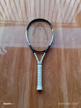 Raket tenis head