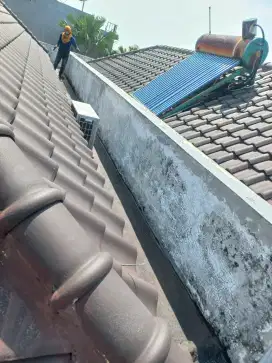 Tukang bangunan,perbaikan atap bocor,dag,talang,kanopi,renopasi dll