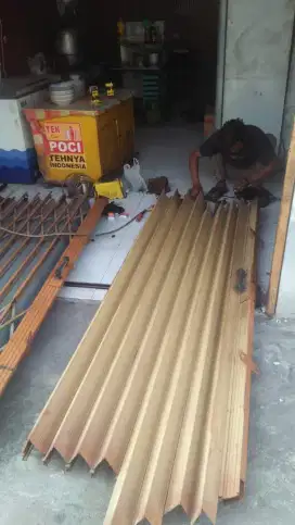 tukang servis folding gate rolling door murah