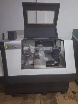 MESIN CNC BUBUT DAN MILLING